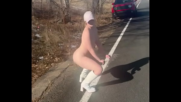 Walking net to the highway fully naked all the cars driving by definitely saw us